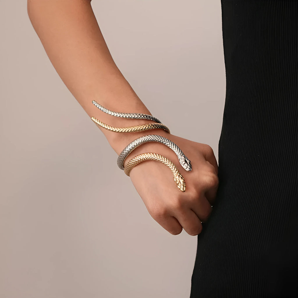 Snake-inspired ring and bracelet set with exaggerated twisted winding design in gold electroplated metal
