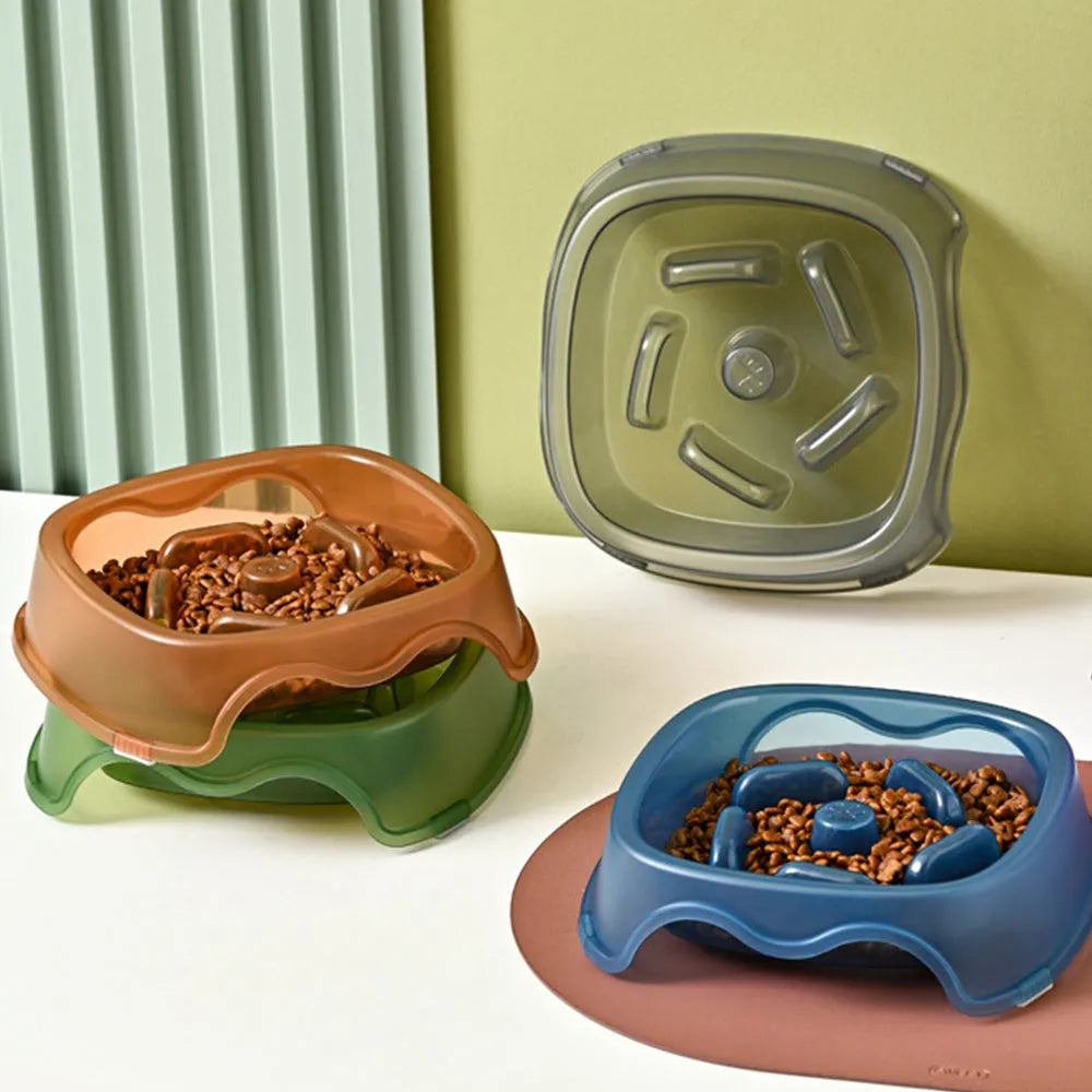 Blue plastic dog slow feeder bowl with raised internal maze pattern for anti-choking feeding