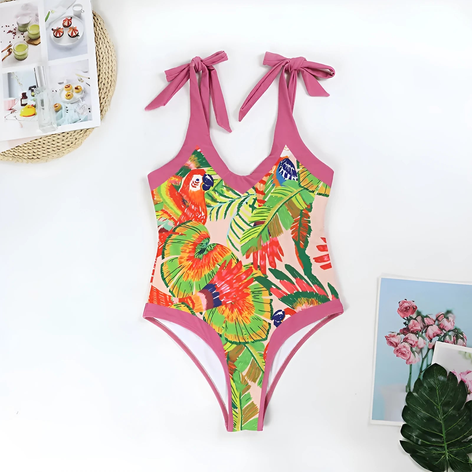 Retro floral print one-piece swimsuit with V-neck, covered belly design and thin skirt in pink colour