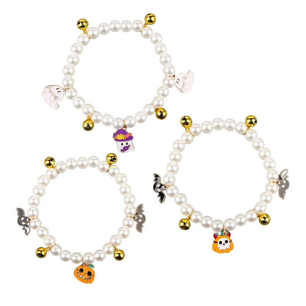 Halloween-themed cat collar with simulated pearl beading showing purple ghost pumpkin design.