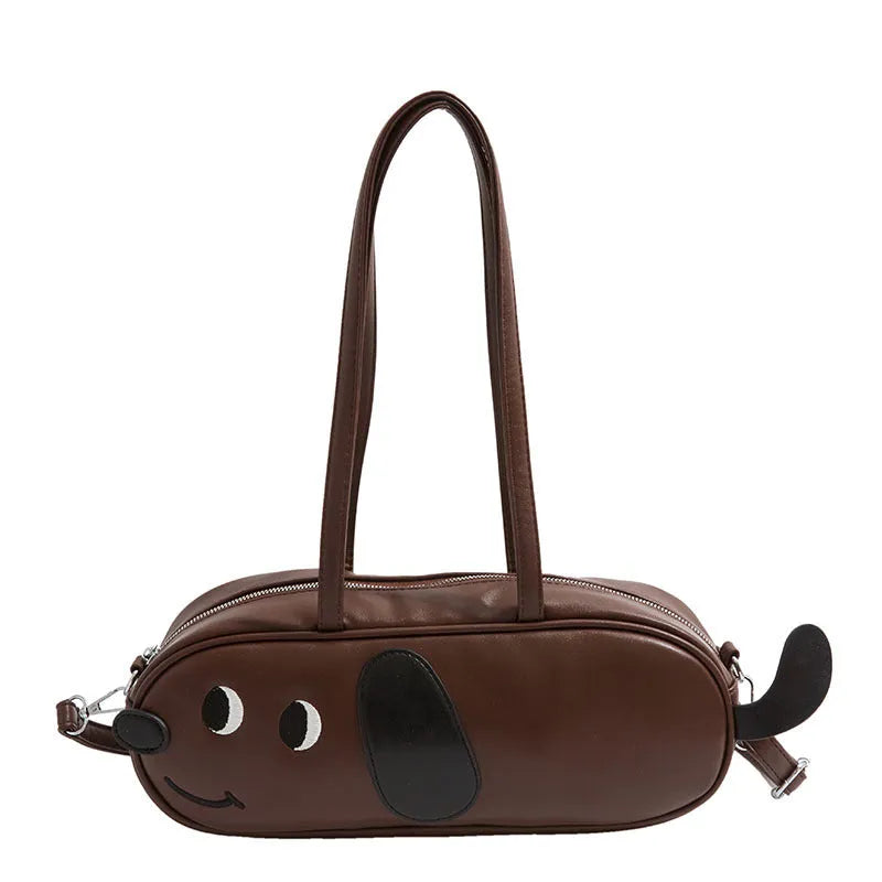 Sausage dog crossbody bag in coffee brown matte finish with single shoulder strap and horizontal shape