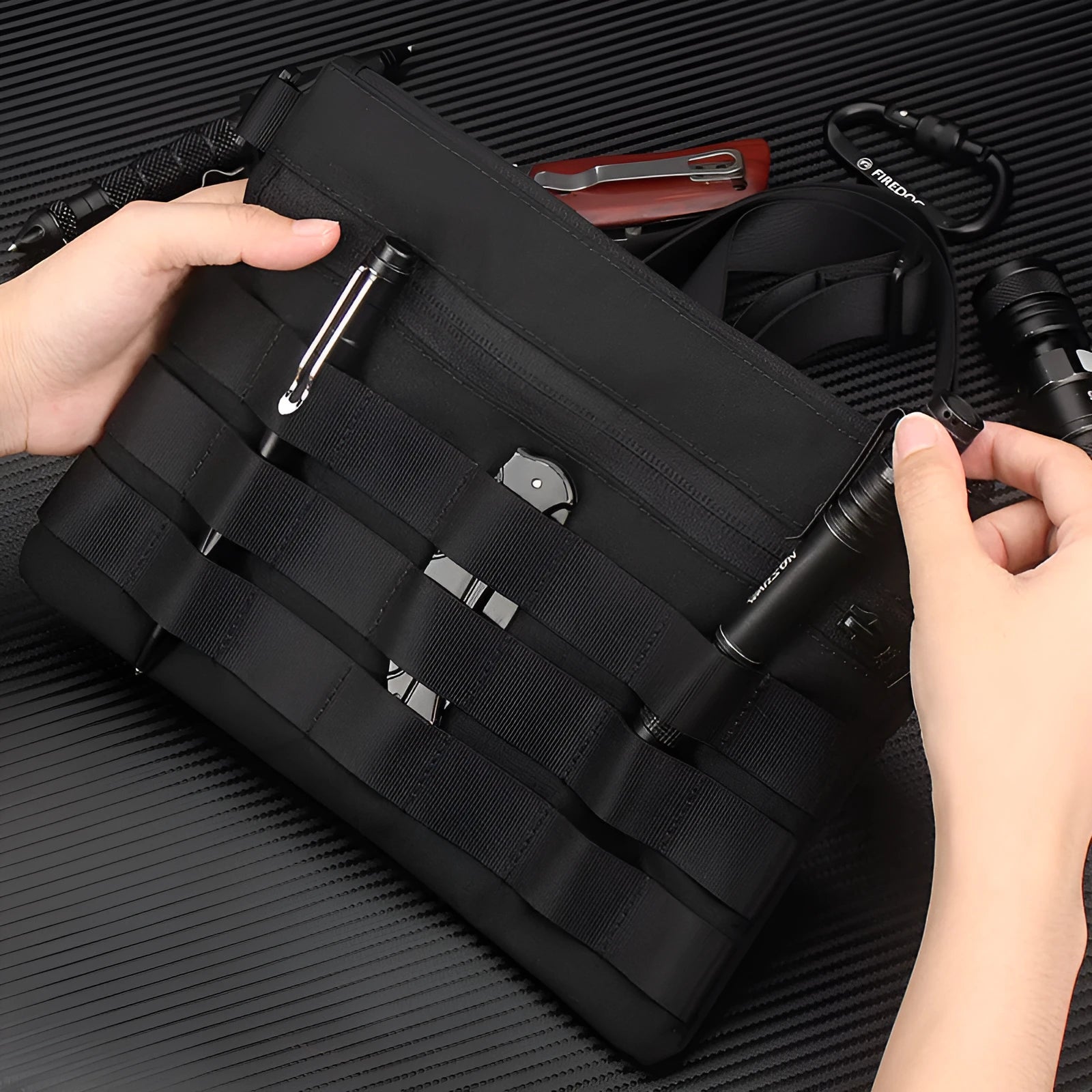 Black Oxford cloth military-style outdoor tactical bag, compact size.
