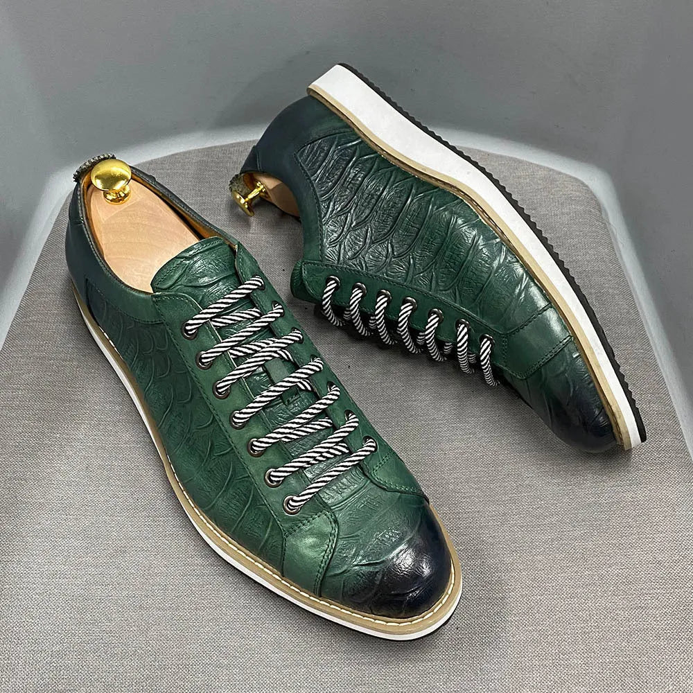 Men's low-top handmade shoes with an embossed pattern and front lace closure, shown in a choice of colours.