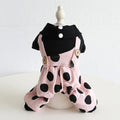 Dog wearing lapel shoulder strap couple outfit with owner, available in four-legged and skirt styles
