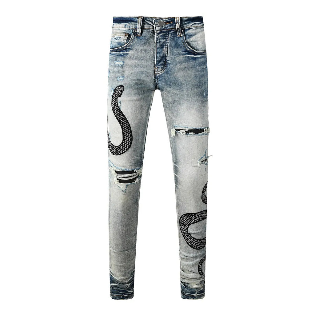 8934Blue distressed skinny jeans with a retro wash and button fly on a mid waist