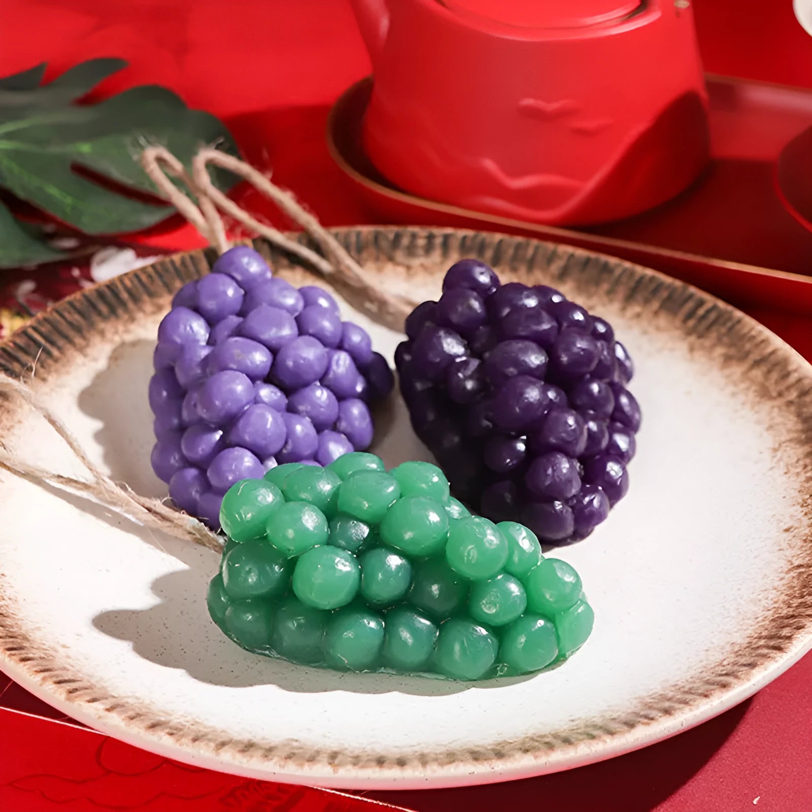 Purple and green grape handmade soap bars showing 80g size and natural grape cluster elements