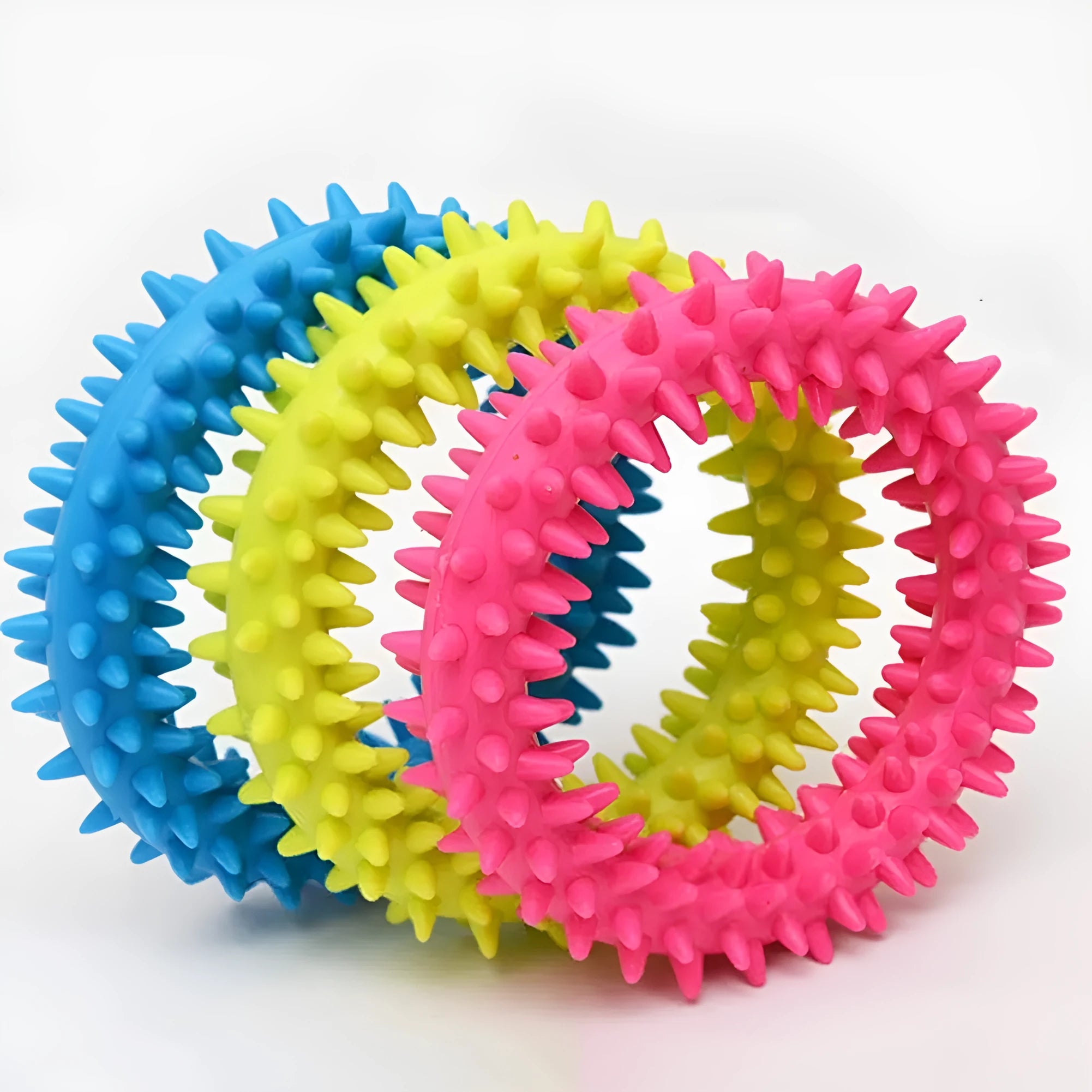 Blue spiky circle ring dog chew toy made of TPR on a white background.