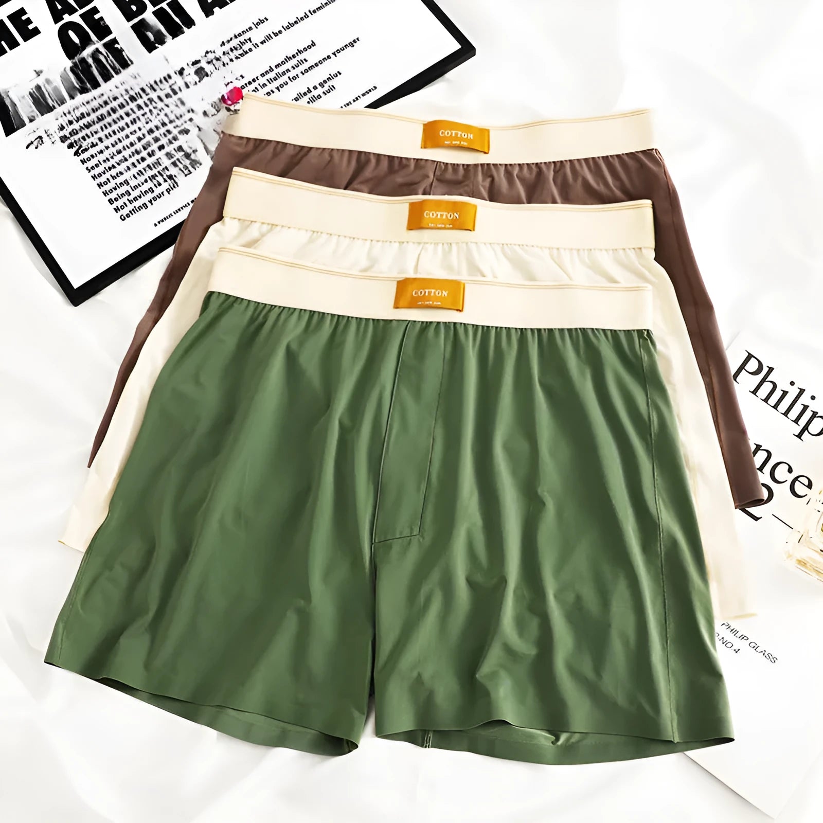 Three pairs of men's solid colour ice silk underwear in loose fit mid-waist design