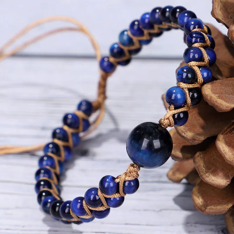 Handmade geometric woven pull bracelet in blue Tigereye stone with visible banding patterns