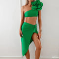 Women's solid colour bikini set with a three-dimensional flower detail on the front.