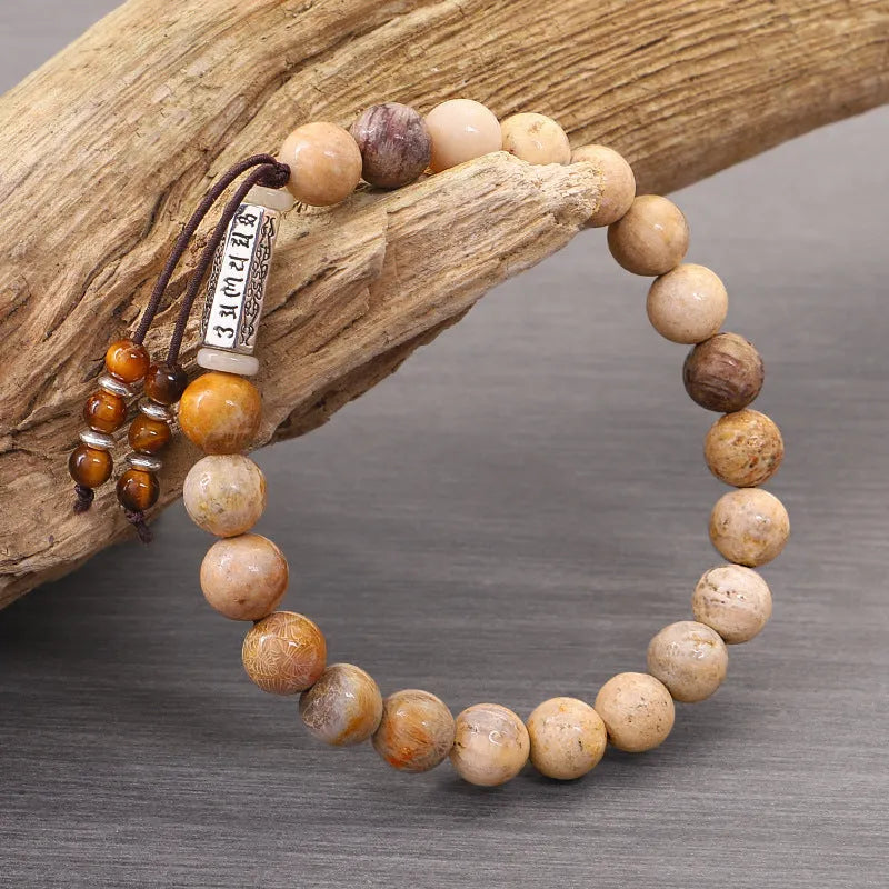 Handmade stone bead bracelet with wooden colour accents in retro minimalist design