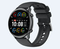 Round touch screen smart sports watch with silicone strap in black, blue, or pink colours