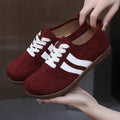 Women's vintage canvas sneakers in dark red and khaki with soft rubber soles and round toe design