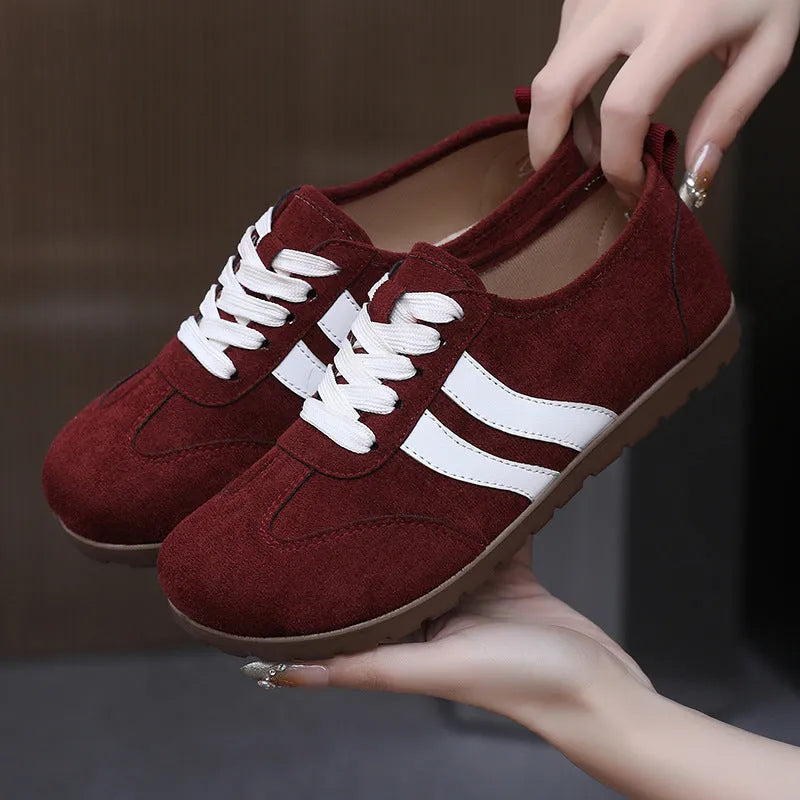 Women's vintage canvas sneakers in dark red and khaki with soft rubber soles and round toe design