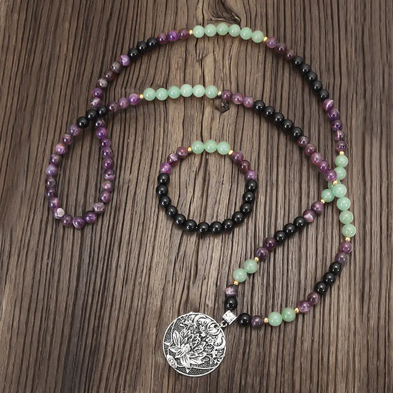 Handmade geometric lotus pendant necklace with stone bead chain and matching bracelet.
