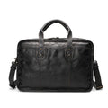 Men's leather briefcase showing multiple interior organisational pockets including laptop compartment