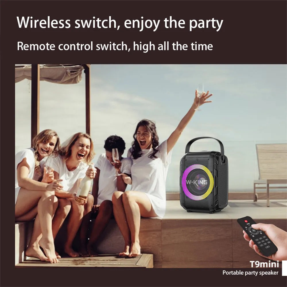 Black Bluetooth speaker with cool light circle in horizontal position on table