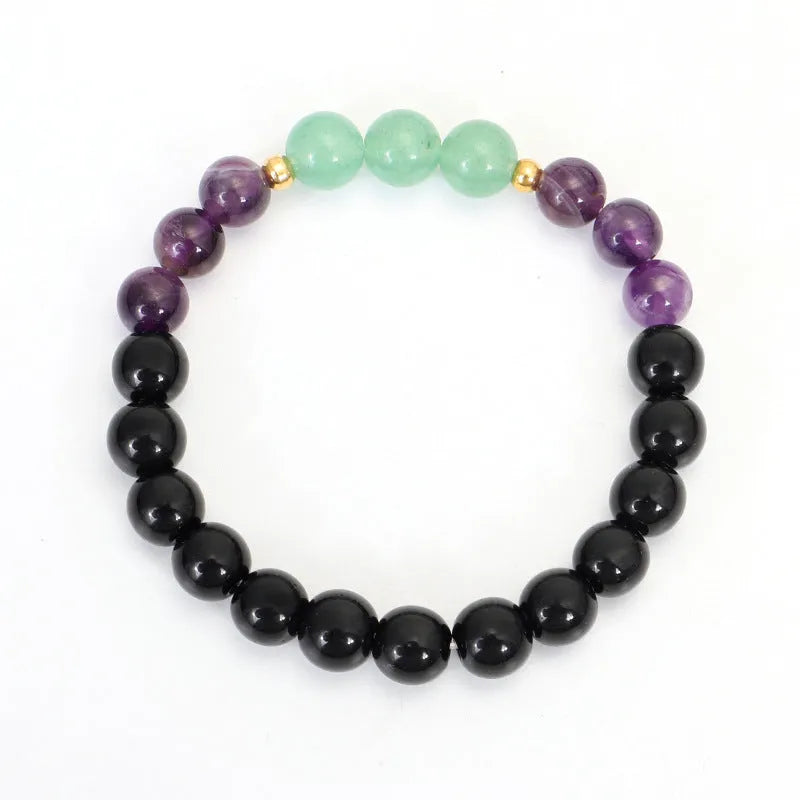 Handmade geometric lotus pendant necklace with stone bead chain and matching bracelet.