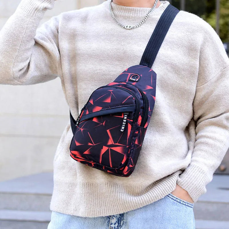Men's blue crossbody sling bag with earphone hole showing square shape and strap
