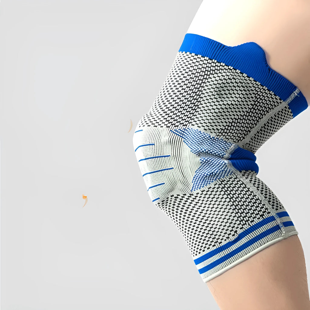 Silicone massage spring bar shock absorber knee pad in black and blue colour, shown with cotton material and sizing tag.