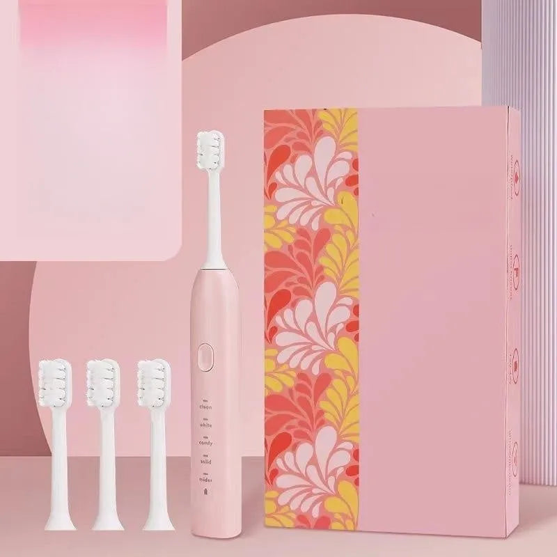 Yellow rechargeable electric toothbrush with small duck design, soft bristles, and a compact size.