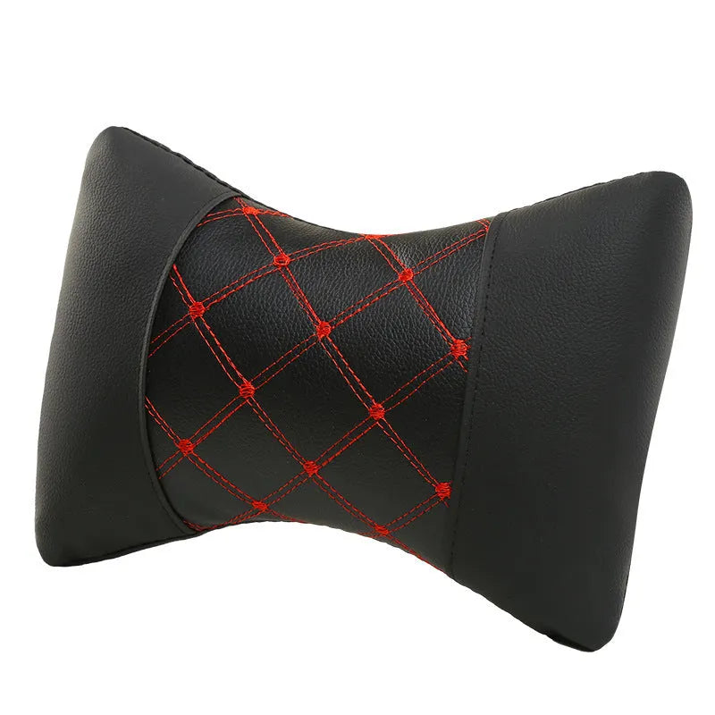 Quilted leather car headrest pillow with diamond pattern and contrast stitching for cervical support
