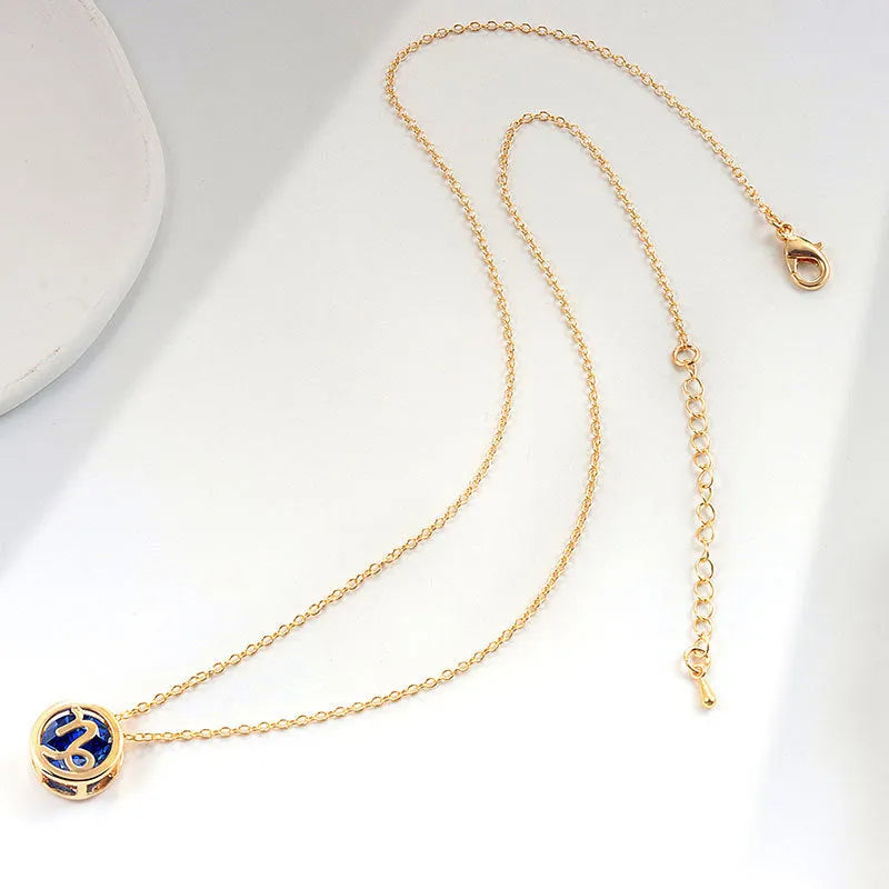 Women's gold electroplated copper zodiac constellation pendant necklace on O-ring chain