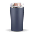 Blue mini electric flour mill and spice grinder with stainless steel grinding chamber.
