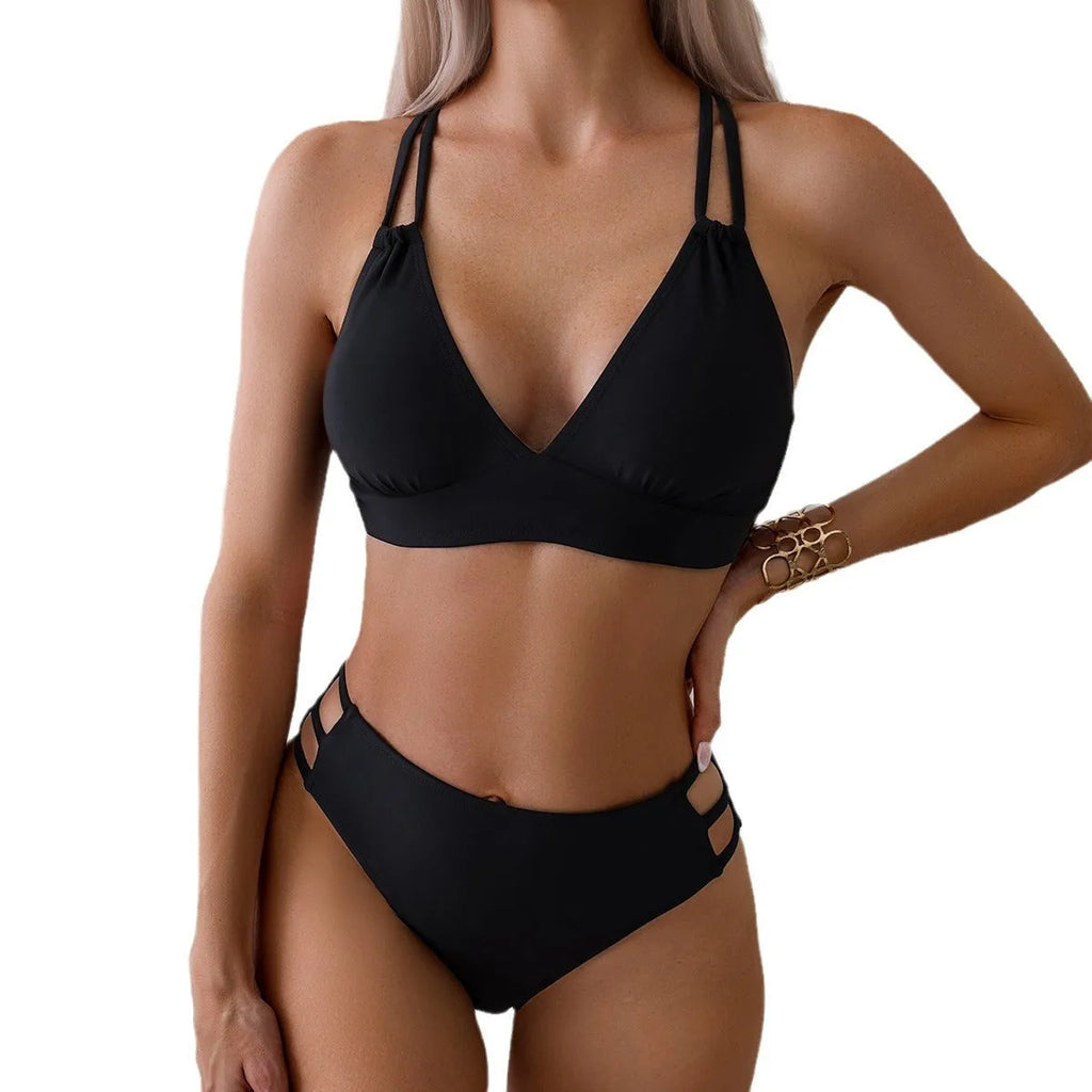 Women's black V-neck halter bikini set with removable pads on a mannequin