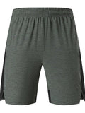 Men's forest green casual shorts with five-point seam construction and mid-waist fit