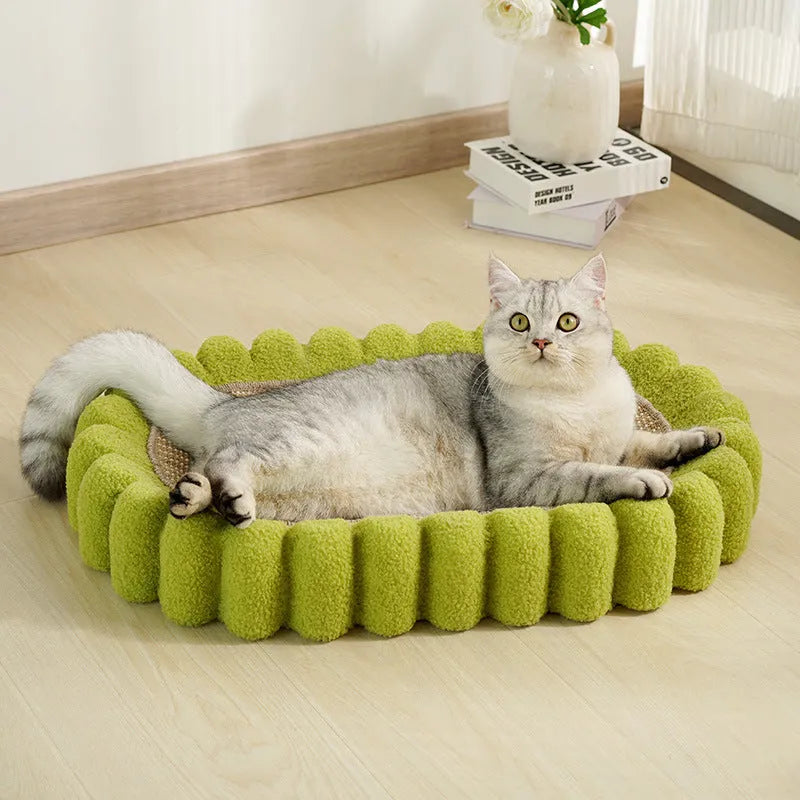 Green oval cat scratch pad bowl with sisal scratching surface serving as cat bed and furniture protector