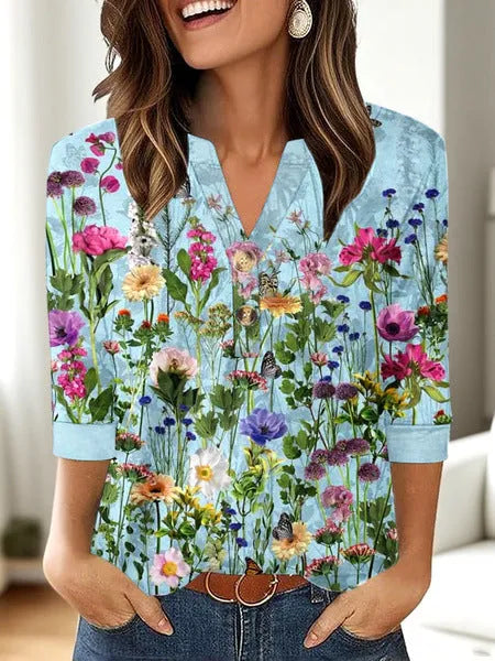 Women's loose-fit casual V-neck top with a 3D pattern design in various colours.