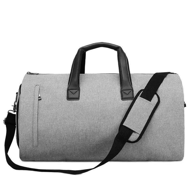 Light grey oval men's travel bag with internal compartments showing wet/dry separation and camera insert pocket.