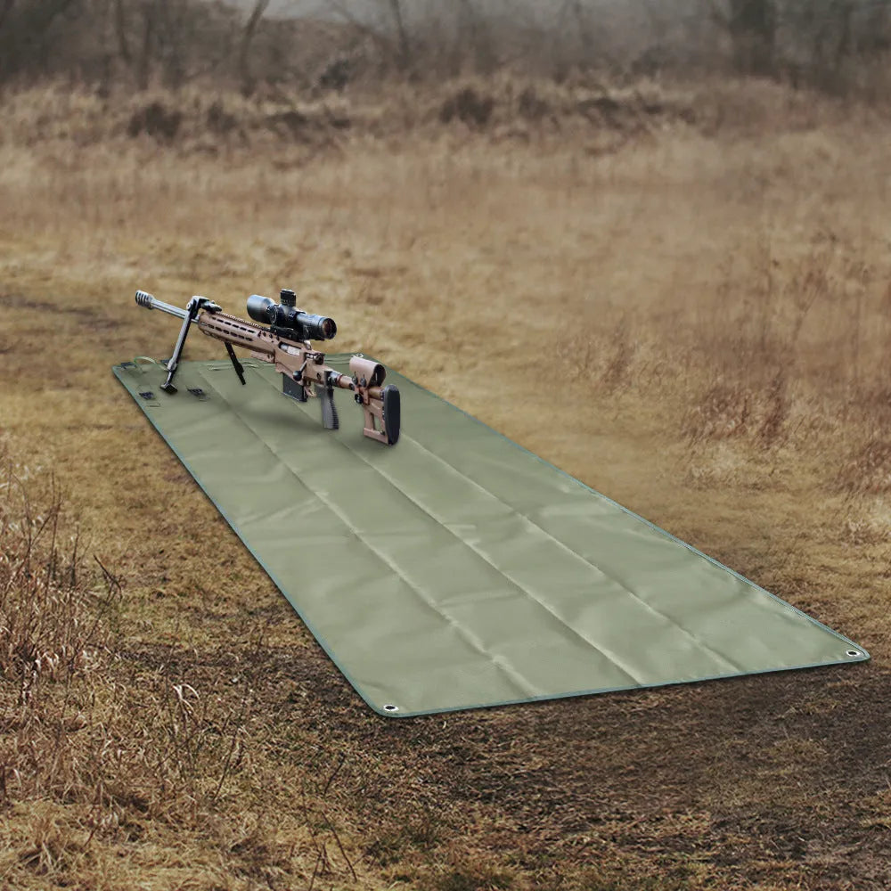 Tactical anti-splashing outdoor camping beach mat in Oxford cloth, 200x75cm, black colour, laid on grass
