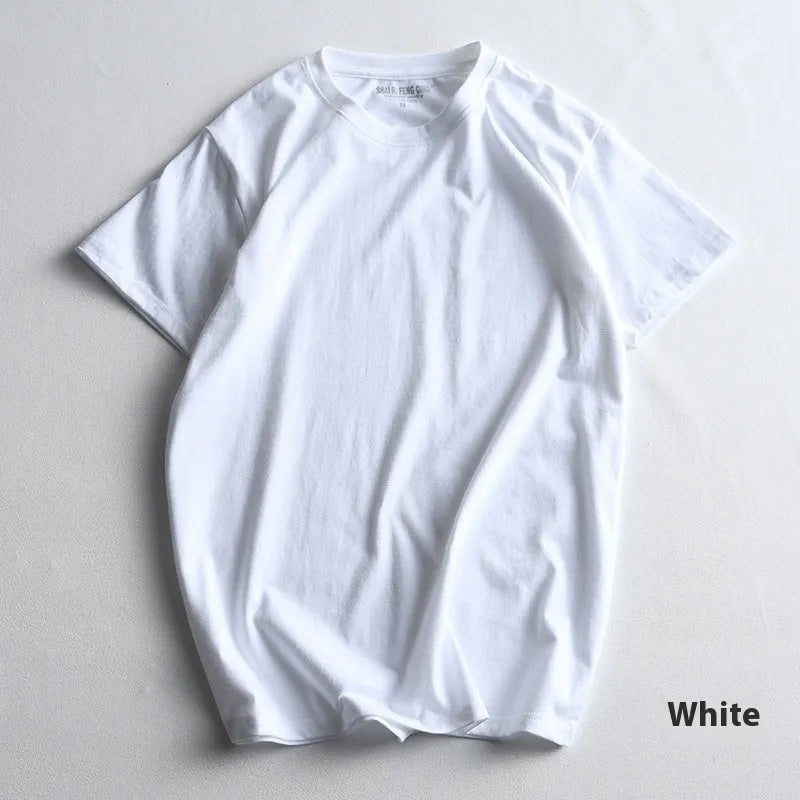 Men's solid colour round neck cotton t-shirt on a hanger, showing short sleeves and casual fit.