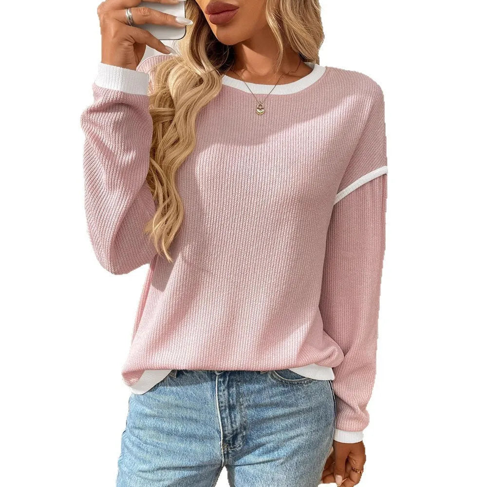Women's loose round neck long sleeve polyester pullover top in multiple colours.