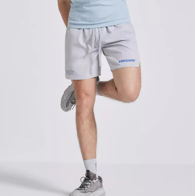 Men's fitness training shorts in black, blue, grey, or white with moisture-wicking fabric.