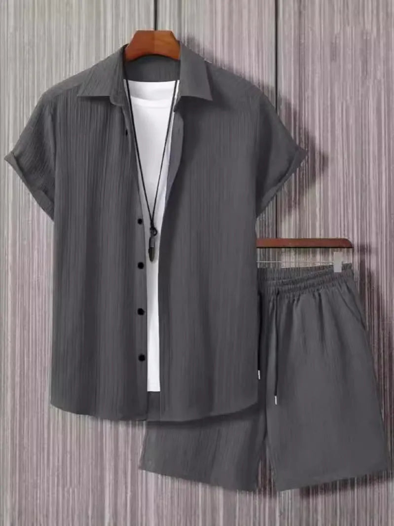 Short sleeve jacket and matching shorts suit set in a solid Jacquard colour on a hanger.