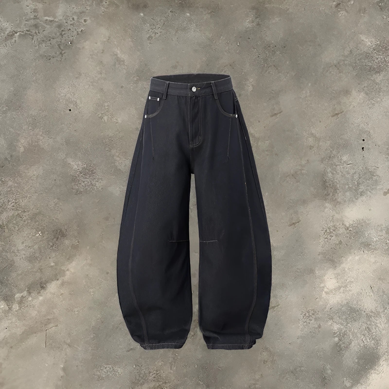 Men's wide leg denim trousers in original cow colour on a hanger, showing the relaxed fit and mid waist design.
