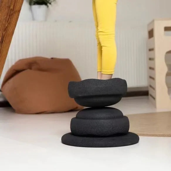 Plastic surf balance board for children in mixed colour wood and black wood designs.