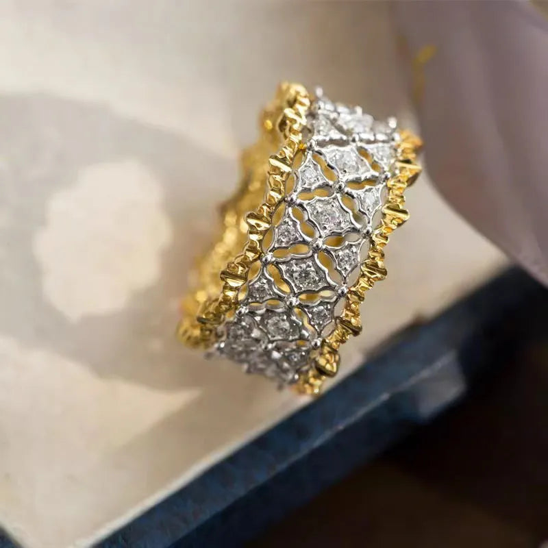 Geometric zircon ring with two-tone gold and silver finish and round centre stone