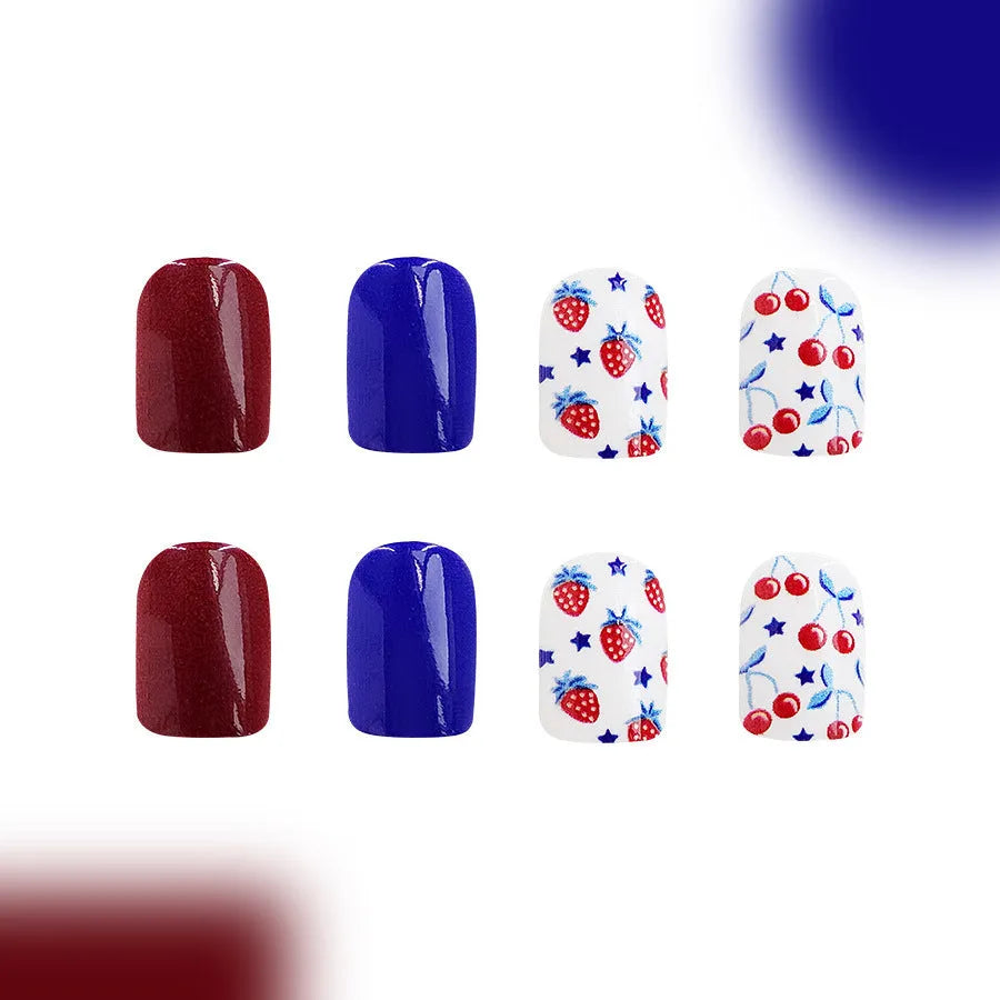 Short glossy red and blue nail stickers with strawberry and cherry patterns - 24 piece set