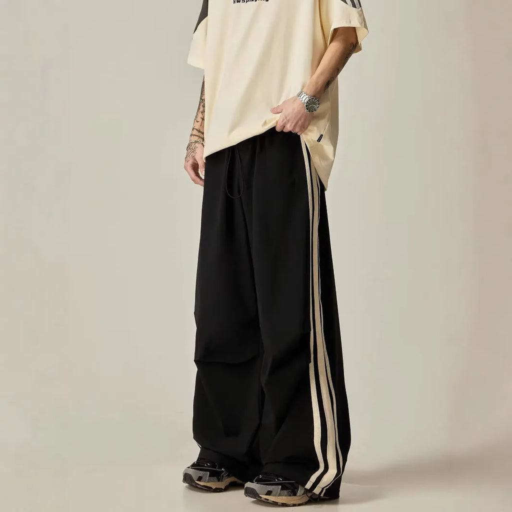 Black wide-leg straight-cut climbing trousers for men with high waist design