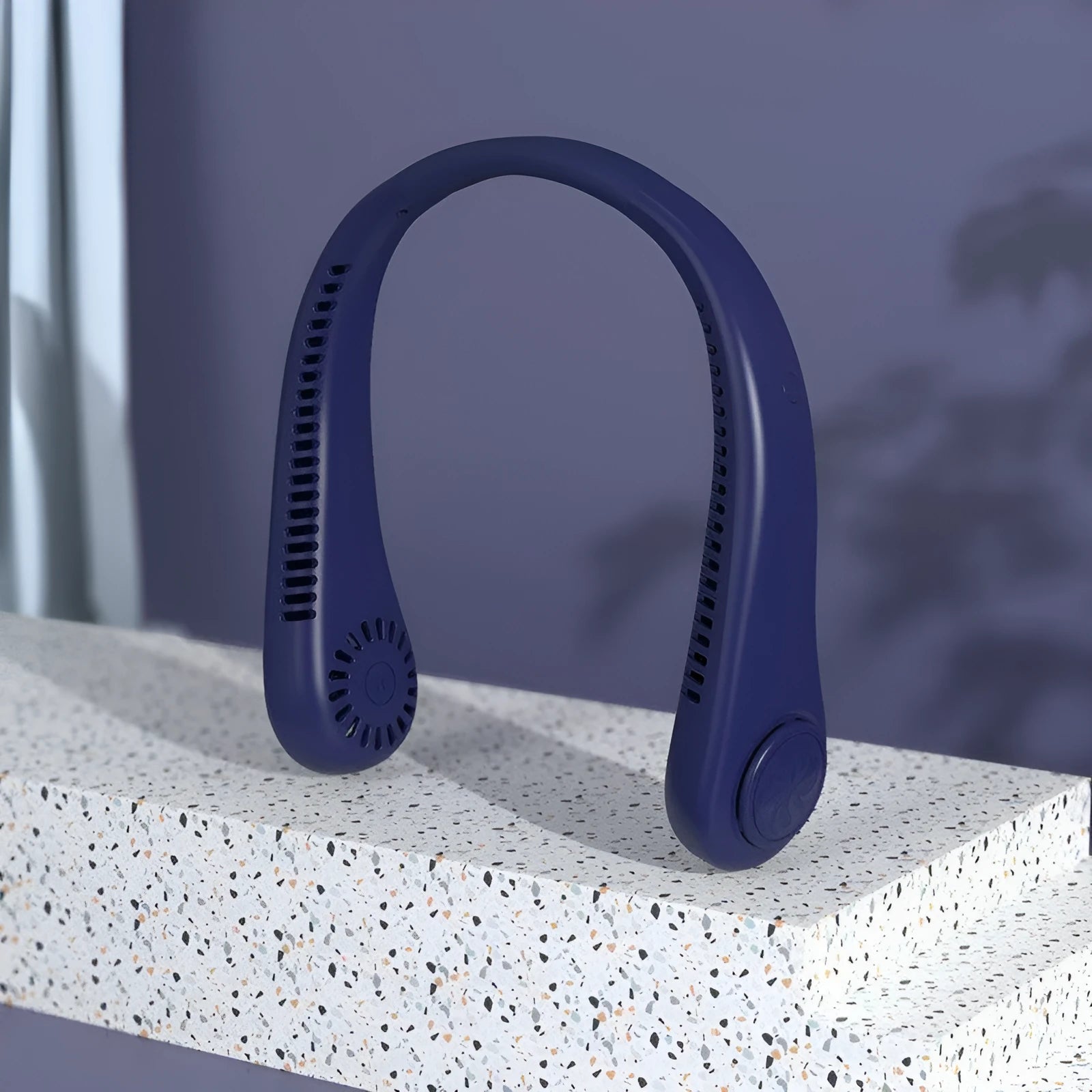 Blue USB rechargeable bladeless neck fan being worn, showing its lightweight design and adjustable controls.
