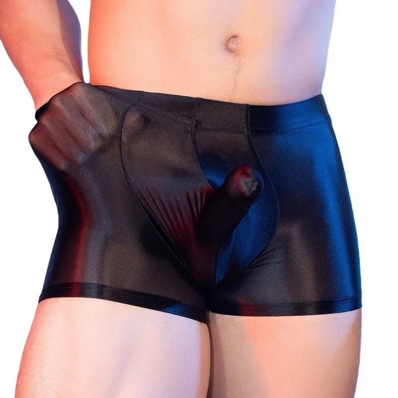 Men's red elephant print boxer shorts on a mid-waist mannequin, showing seamless construction.