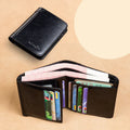Men's leather wallet open showing photo window, card slots, coin pocket, and banknote compartment.