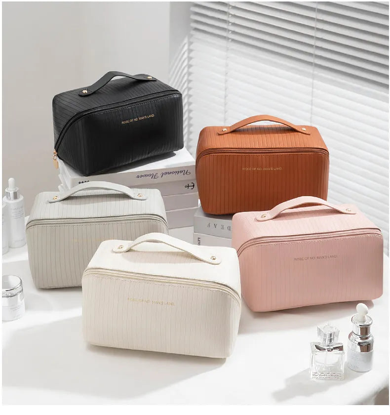 Vertical stripe pattern cubic makeup bag in PU leather measuring 22.5 cm