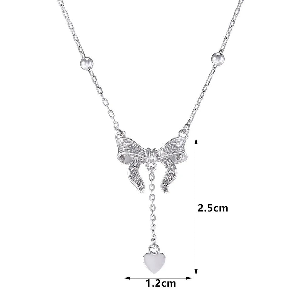 S925 silver necklace with heart-shaped pendant featuring butterfly and bow design on adjustable O-ring chain