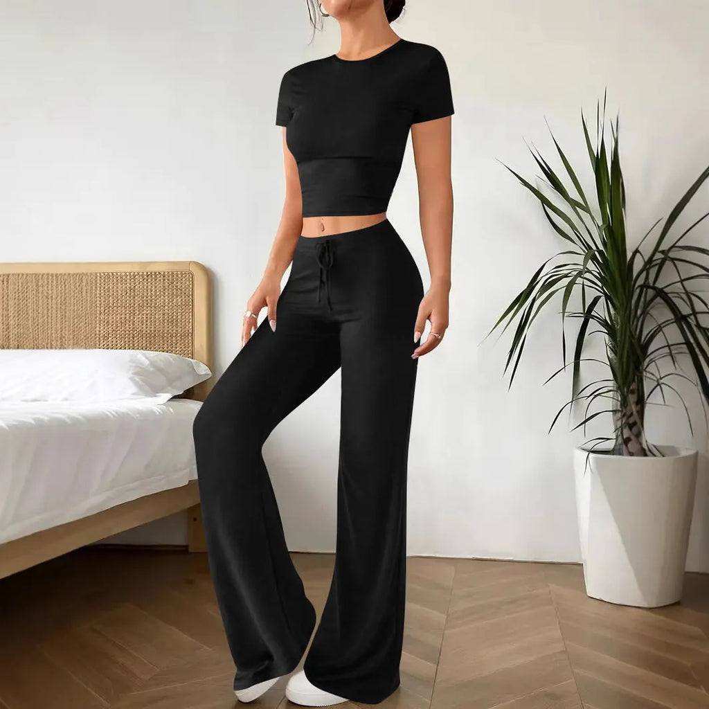Black women's co-ord set with high waist trousers and a regular sleeve t-shirt