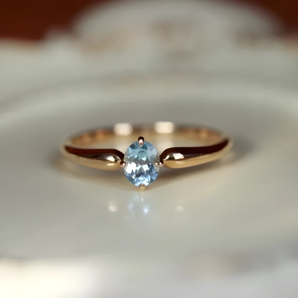 S925 sterling silver geometric ellipse ring with micro inlay finish in yellow gold colour on white background